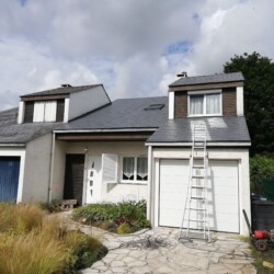 Pose de tuiles plates neuves